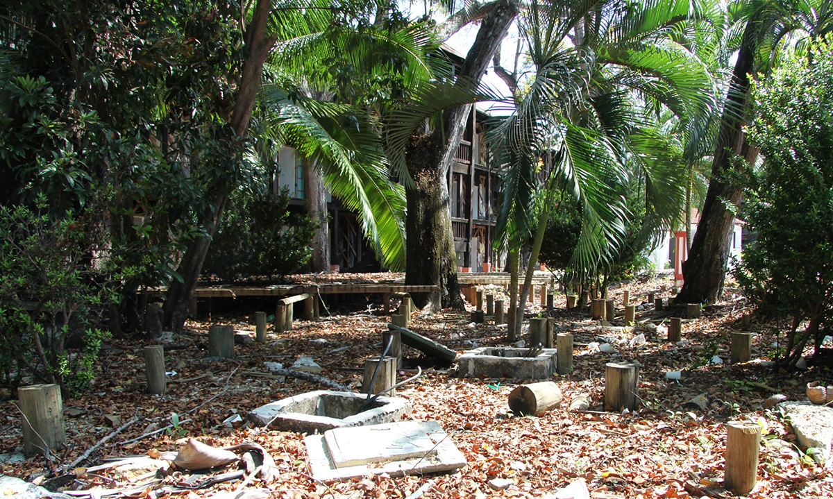 Wood pilings are now visible where a wooden deck once was.