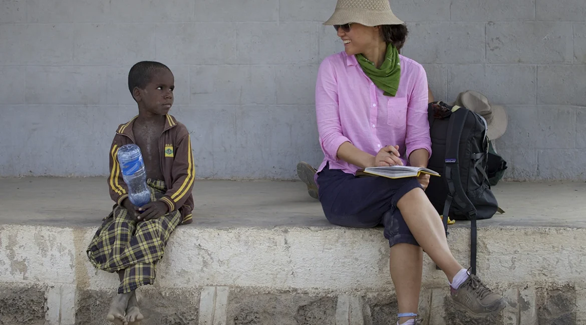Joyce chatting with an Afar boy at a military check-point village.